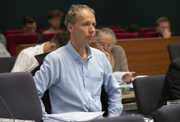 Author Nicky Hager listening to Kristy McDonald QC during her submissions at the Operation Burnham Inquiry at the High Court in Wellington.