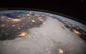 A photo from the International Space Station shows lights in the central US (December 2014).
