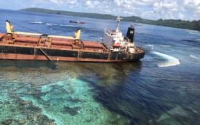 The MV Solomon Trader stuck on a reef off of Rennell Island in the Solomon Islands.
