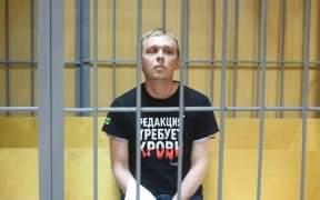 Russian investigative journalist for Meduza website Ivan Golunov waits in a court room, in Moscow's Nikulinsky Court, Russia.
