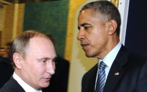 Russian President Vladimir Putin meets with US President Barack Obama
