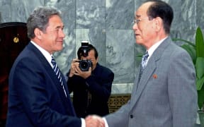 Winston Peters (left) shakes hands with  a representative of the North korean government at a meeting in Pyongyang in 2007.