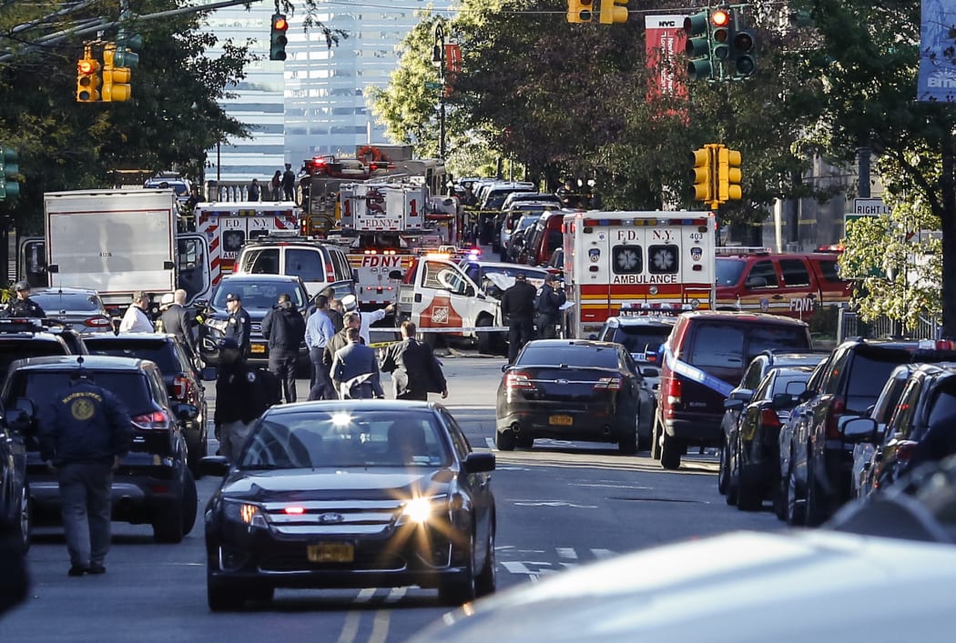 Emergency personnel respond after reports of multiple people hit by a truck after it plowed through a bike path in lower Manhattan on October 31, 2017 in New York City.
