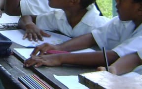 Primary school students in class at Daku School, Fiji