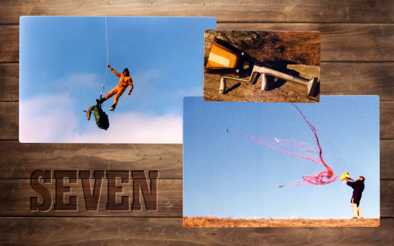 A timber wall reminiscent of a hunting hut has the word "seven" stamped into it like a cattle brand. On the wall are three photos, one of "strop riding" dangling below a helicopter, one of a net gun and one of a man firing a net gun