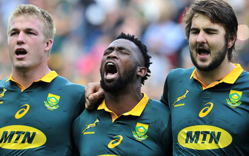 Pieter-Steph du Toit, Siya Kolisi and Lood de Jager of South Africa sing the national anthem before the Rugby Championship game between South Africa and New Zealand at Newlands, 2017.