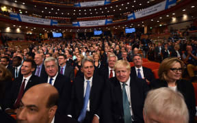 British Health Secretary Jeremy Hunt, British Defence Secretary Michael Fallon, British Chancellor of the Exchequer Philip Hammond, British Foreign Secretary Boris Johnson, and British Home Secretary Amber Rudd sit in the audience on the final day of the annual Conservative Party conference