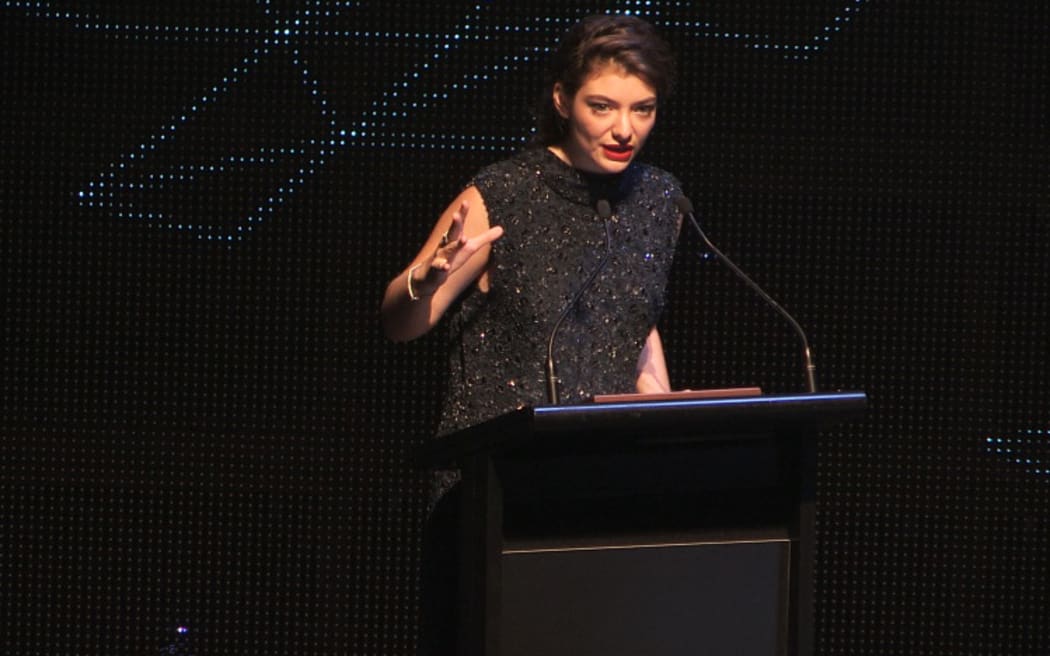 Ella YelichO'Connor (Lorde) accepts the Most Performed Work Award for the songs 'Team' (New Zealand) and 'Royals' (International) at the 2014 Silver Scroll Awards at TSB Arena