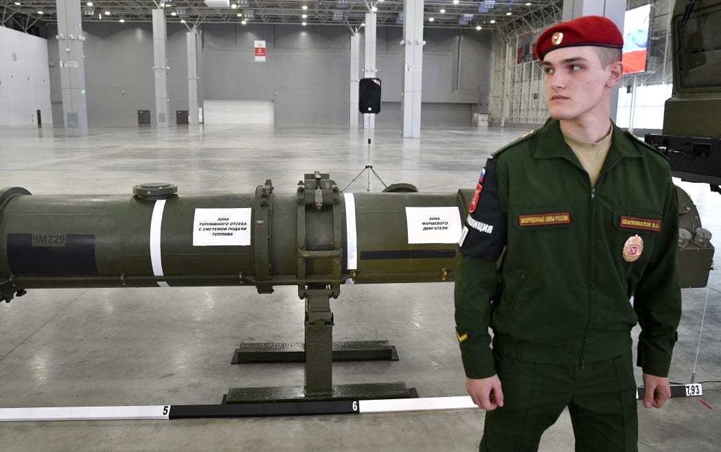 A soldier guards the Russian 9M729 missile during its demonstration to foreign military attache after Intermediate-Range Nuclear Forces Treaty (INF) briefing in the Patriot military park, outside Moscow, Russia.