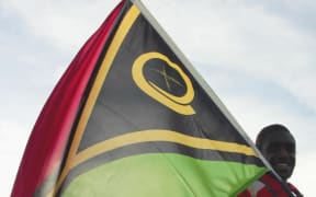 Vanuatu flag displayed during Paralympic ceremony