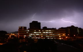 Lightning flash over a multi-storey building in Molesworth St, Wellington.