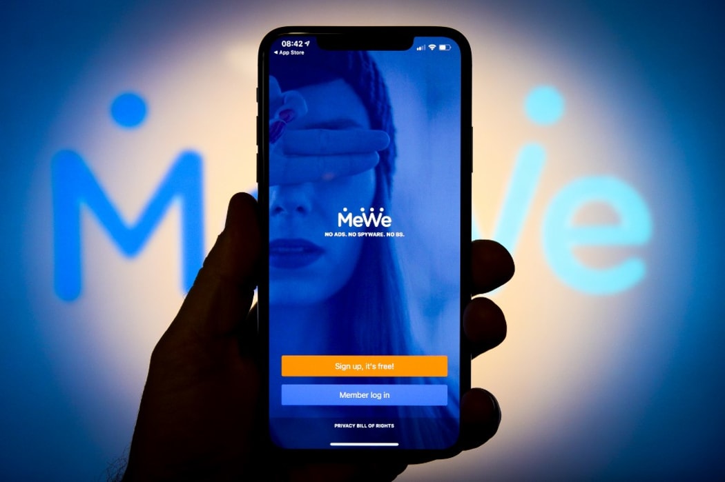 The MeWe social networking application is seen on an Apple iPhone in this photo illustration in Warsaw, Poland on January 12, 2021.