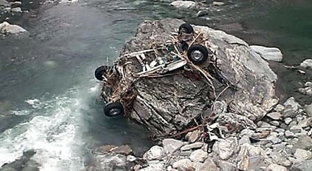 Part of the couple's vehicle found in the Haast River.