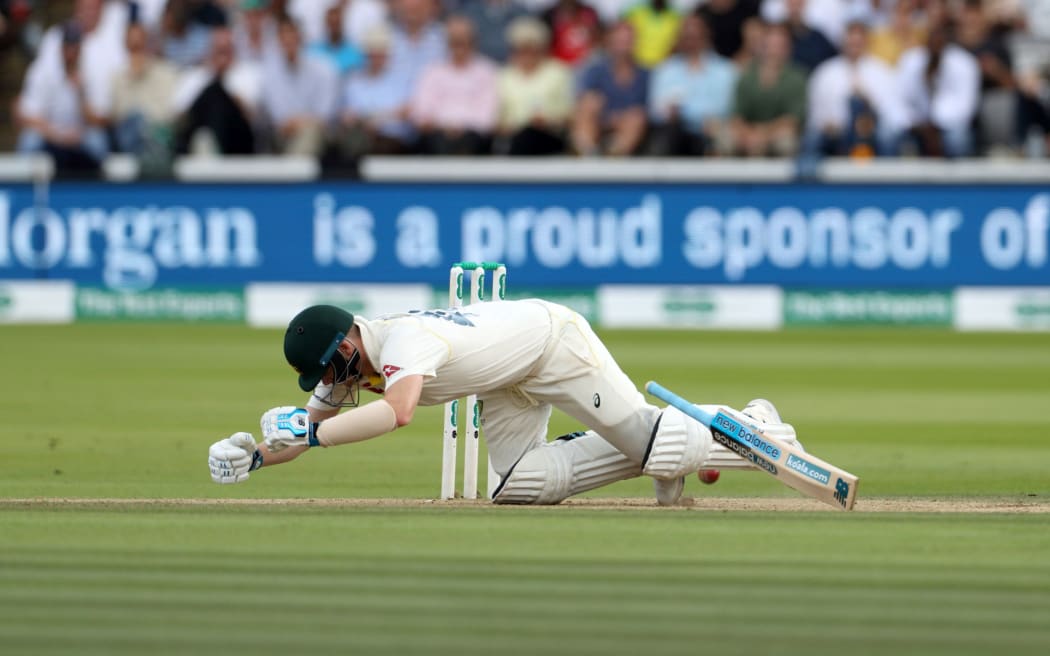 Steve Smith is struck on the neck and felled by a Jofra Archer bouncer during the 2nd Ashes Test Match between England and Australia at Lord's 2019.