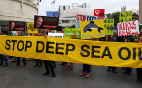 Protesters against deep sea oil exploration outside an Auckland council meeting.