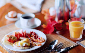 14969115 - delicious breakfast with eggs benedict, bacon, orange juice and coffee
