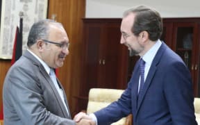 UN High Commissioner for Human Rights, Zeid Ra'ad Al Hussein (right) meets PNG Prime Minister Peter O'Neill.