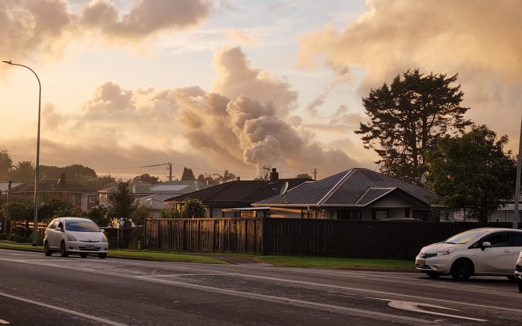 A huge plume of smoke was still billowing from the fire in a scrap yard on James Fletcher Drive on Wednesday morning.