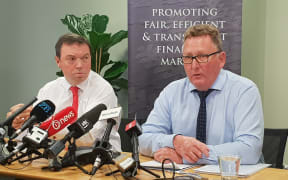 Financial markets authority head Rob Everett (left) and RBNZ Governor Adrian Orr talk about the insurance report.