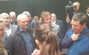 Labour leader Jacinda Ardern speaks to farmers in Hamilton.