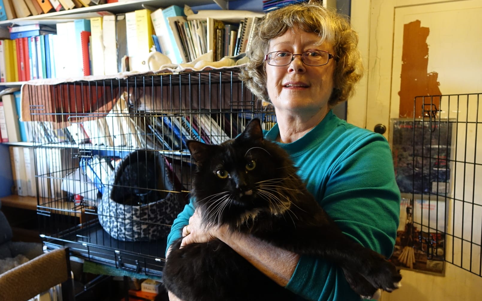Jane Newman with Thorin, one of the feral toms rescued from the red zone.