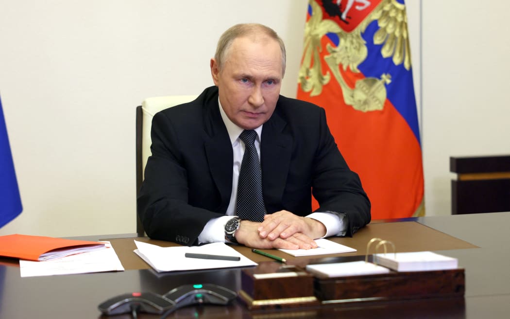 Russian President Vladimir Putin chairs a Security Council meeting via a video link at the Novo-Ogaryovo state residence outside Moscow. He has introduced martial law in Donetsk, Lugansk, Kherson and Zaporizhzhia.