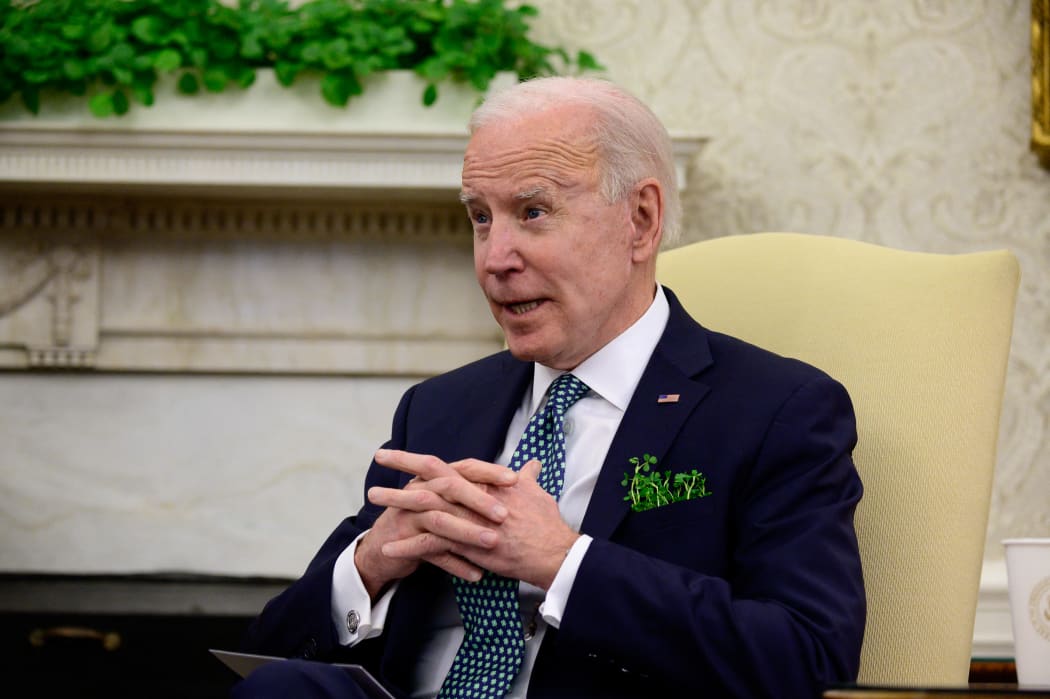 US President Joe Biden speaks during a virtual meeting with Irish Prime Minister (Taoiseach) Micheal Martin in the Oval Office of the White House on March 17, 2021 in Washington, DC.