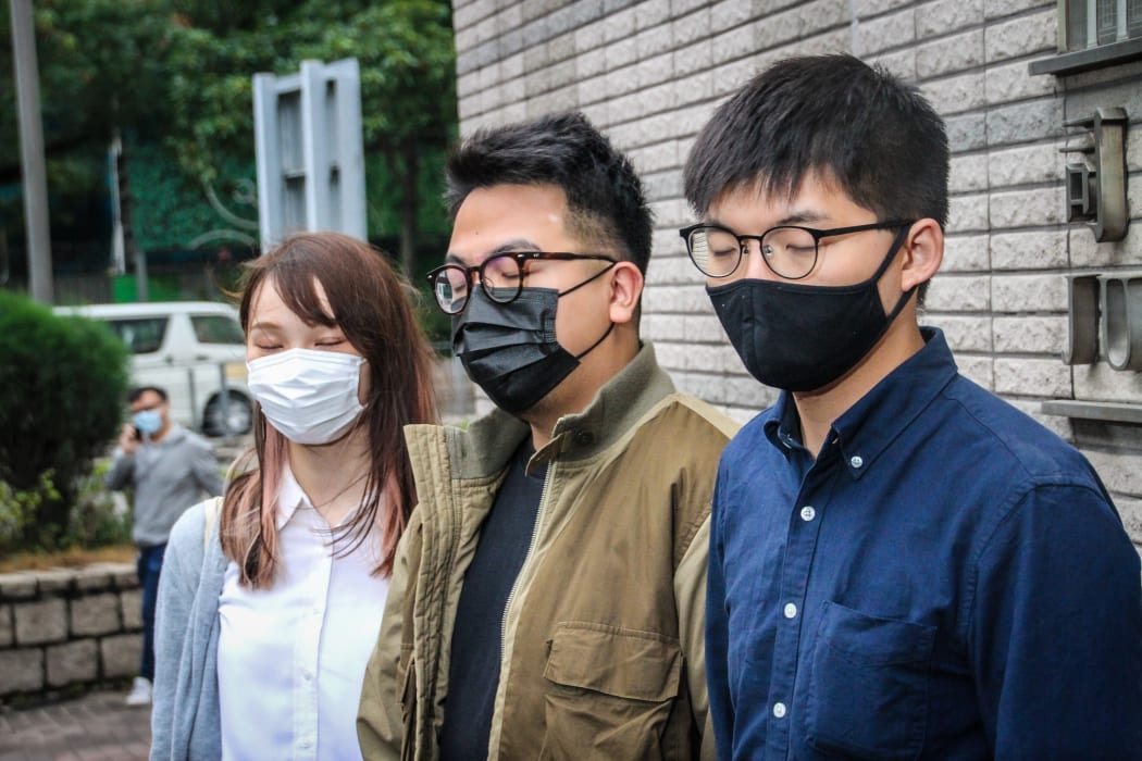 Hong Kong activists Agnes Chow, Ivan Lam and Joshua Wong.