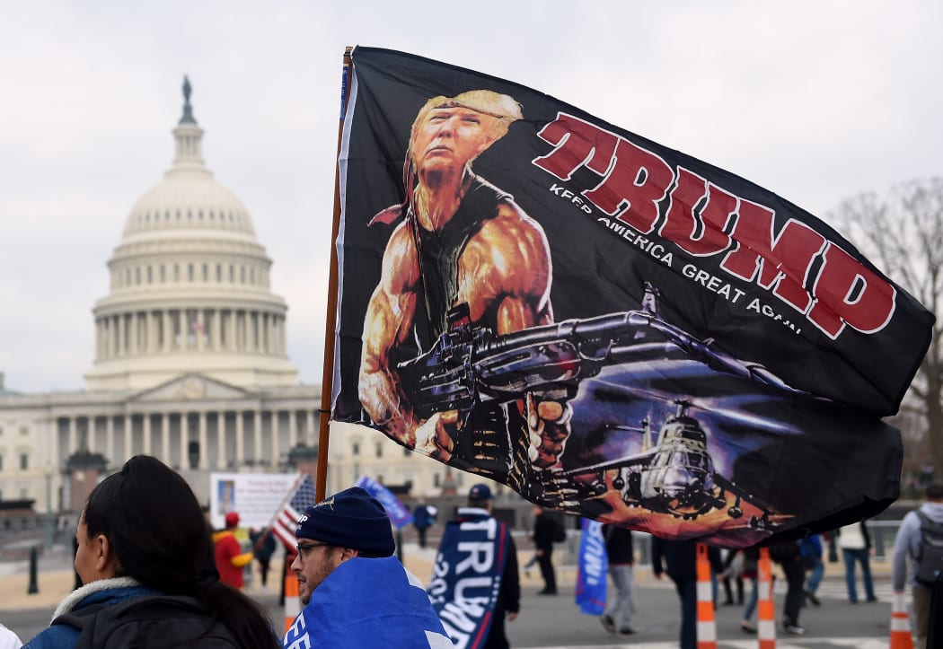 Supporters of US President Donald Trump participate in the Million MAGA March  to protest the outcome of the 2020 presidential election, in front of the US Capitol on December 12, 2020 in Washington, DC. (Photo by Olivier DOULIERY / AFP)