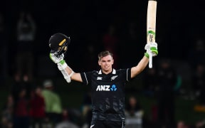 Tom Latham of the Black Caps reachres 100 runs during the 2nd ODI cricket match,