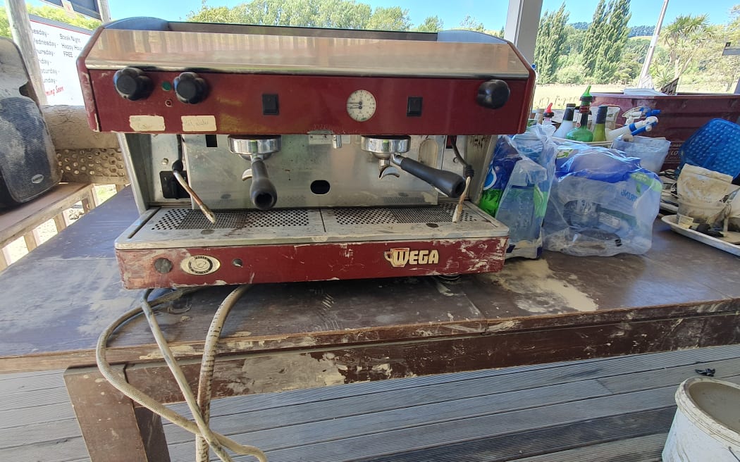 Floodwaters reached almost to the bartop, and this coffee machine , in Tinui pub, near the cost in Wairarapa.