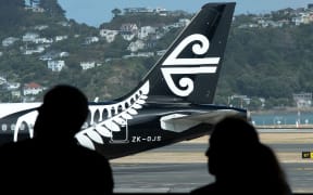 An Air New Zealand airplane waits for passengers at Wellington International airport on February 20, 2020.