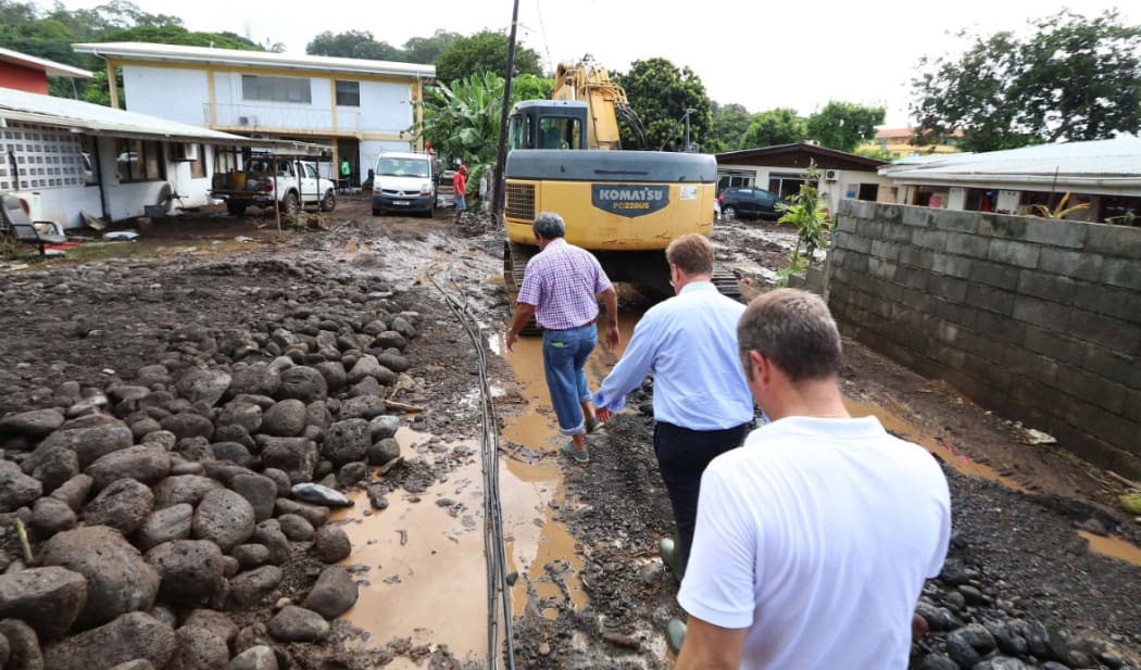 Assessing the damage after severe storms caused flooding across Tahiti.