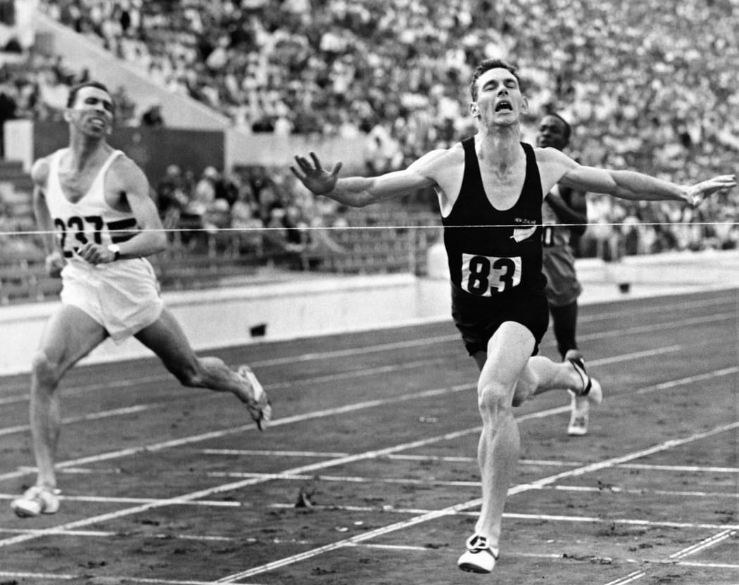 Peter Snell sprints to win the 800m final in front of Roger Moens from Belgium on 2 September 1960 during the Olympic Games in Rome.