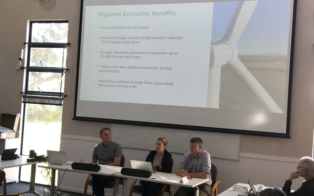 The regional economic benefits of the new Kaiwaikawe Wind Farm are highlighted on a projection at a Kaipara District Council meeting in Dargaville on 28 September, 2022.