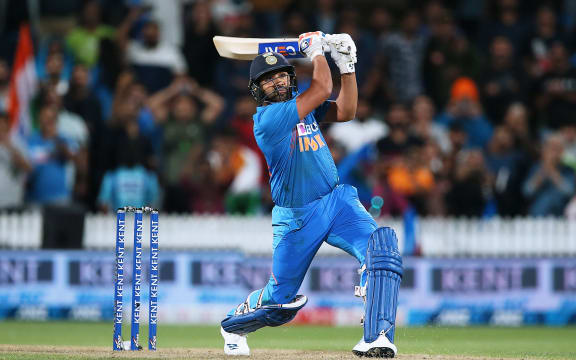 India's Rohit Sharma hits a six.