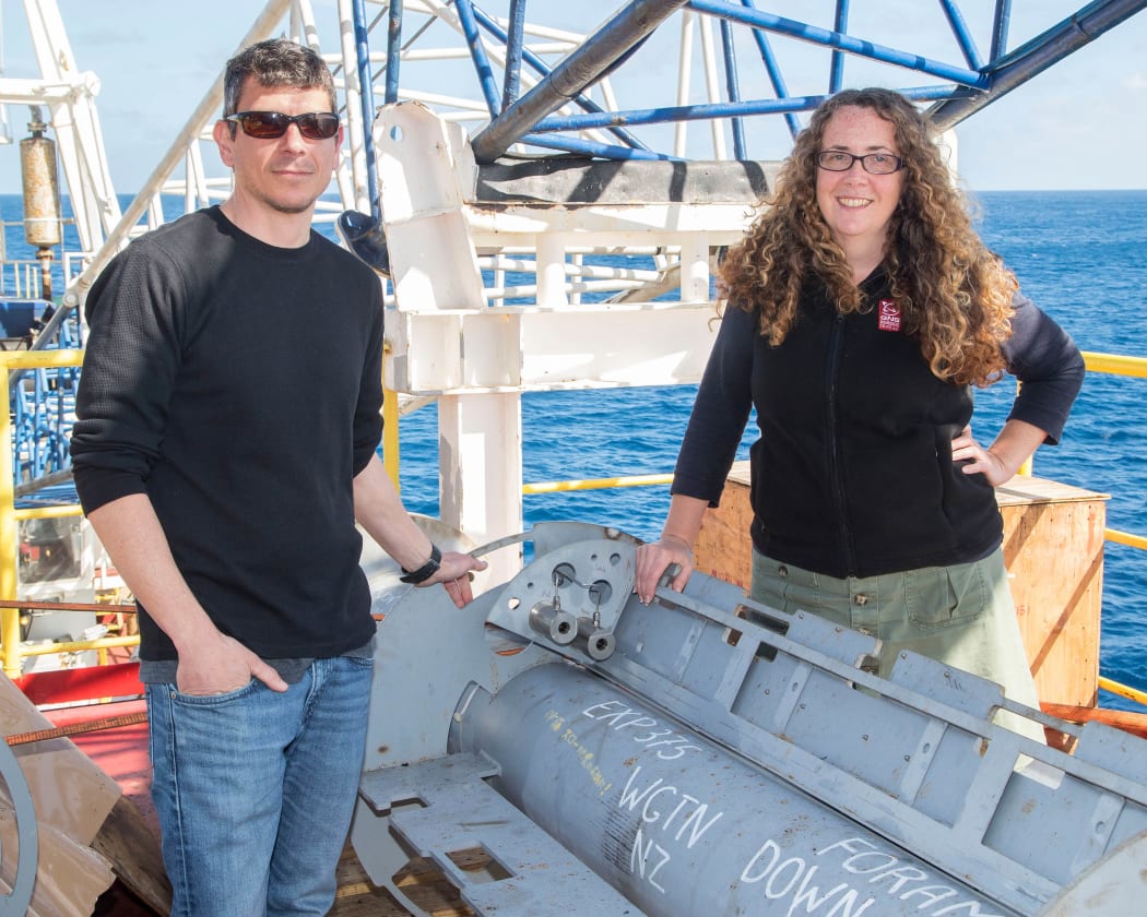 Laura Wallace and Demian Saffer on the JOIDES Resolution with one of two sub-seafloor earthquake observatories that have been placed on the Hikurangi subduction zone.