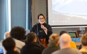 Ngāi Tahu kaiwhakahaere (director) Lisa Tumahai opens the Climate Change Symposium.