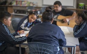 Students in Auckland take part in the Aha mentoring programme which uses music to combat bullying.