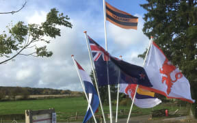 Acting Flight Lieutenant Dobbin’s nephew organised the delivery of a Taranaki rugby flag to be flown at the unveiling in the Netherlands.