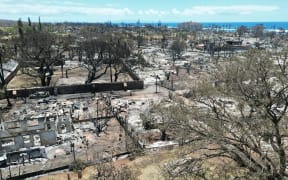 This aerial photo shows destroyed buildings and homes in the aftermath of a wildfire in Lahaina, western Maui, Hawaii on August 11, 2023. A wildfire that left Lahaina in charred ruins has killed at least 55 people, authorities said on August 10, making it one of the deadliest disasters in the US state's history. Brushfires on Maui, fueled by high winds from Hurricane Dora passing to the south of Hawaii, broke out August 8 and rapidly engulfed Lahaina. (Photo by Sébastien VUAGNAT / AFP)