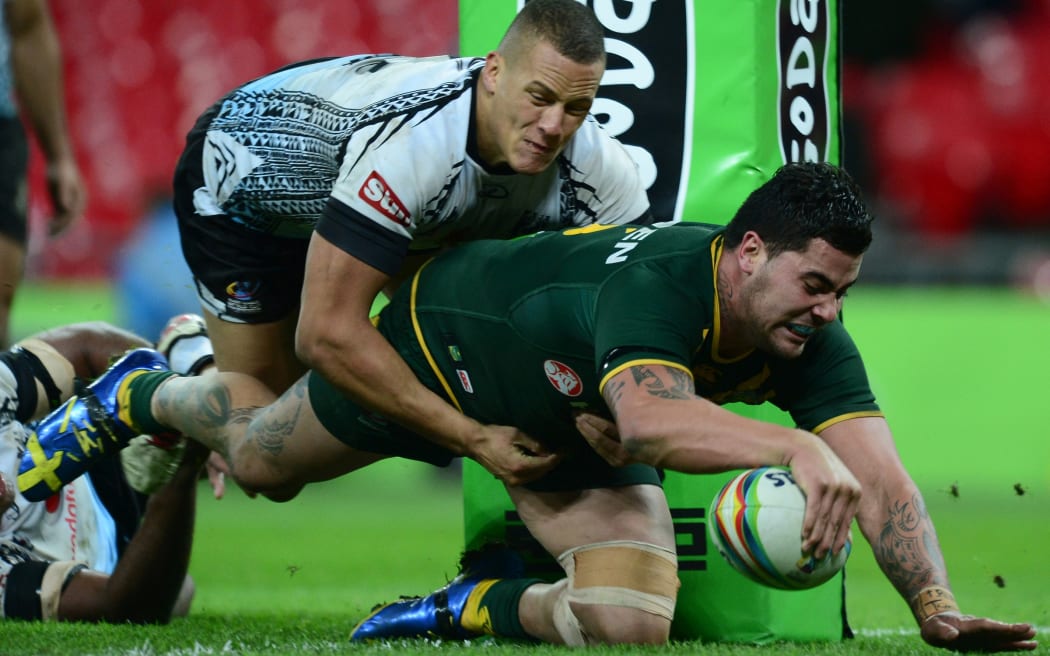 Andrew Fifita scores a try for Australia at the 2013 World Cup.