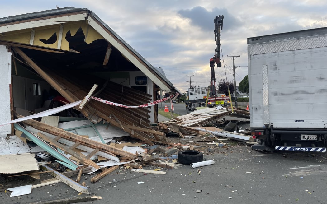 A milk truck hit a car and a house in North End, Oamaru on 23 January, 2023.