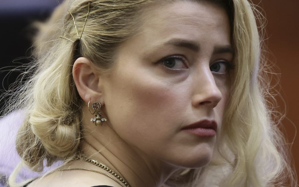 Actor Amber Heard waits before the jury said that they believe she defamed ex-husband Johnny Depp.