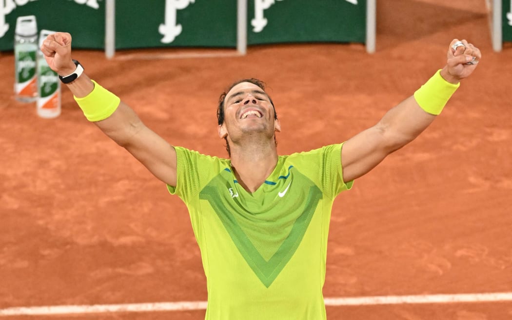 Rafael Nadal of Spain celebrates his victory after winning the match against Novak Djokovic in quarterfinal during French Open tennis tournament 2022.