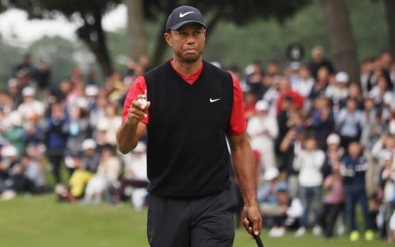 Tiger Woods of the US reacts after a birdie on the 5th hole green during the fourth round of the PGA Zozo Championship golf tournament at the Narashino Country Club in Inzai, Chiba prefecture on October 27, 2019. (Photo by Toshifumi KITAMURA / AFP)