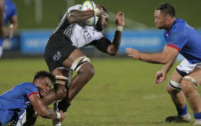 Fiji's Semi Kunatani is tackled in their 10-3 win over Samoa in the World Rugby Pacific Nations Cup 2019 at ANZ Stadium in Suva on 10 August.