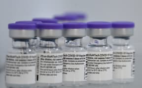 A photo shows Pfizer-BioNTech Covid-19 vaccine bottles at the Emile Muller hospital in Mulhouse, eastern France, on January 8, 2021.