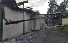 Crowds set fire to a number of buildings at the University of Technology in Lae, Papua New Guinea, leaving extensive damage.