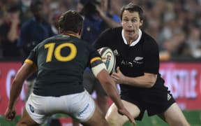 Ben Smith of the All Blacks steps outside Handre Pollard of the Springboks during the Rugby Championship test match in Johannesburg. October 2014.
